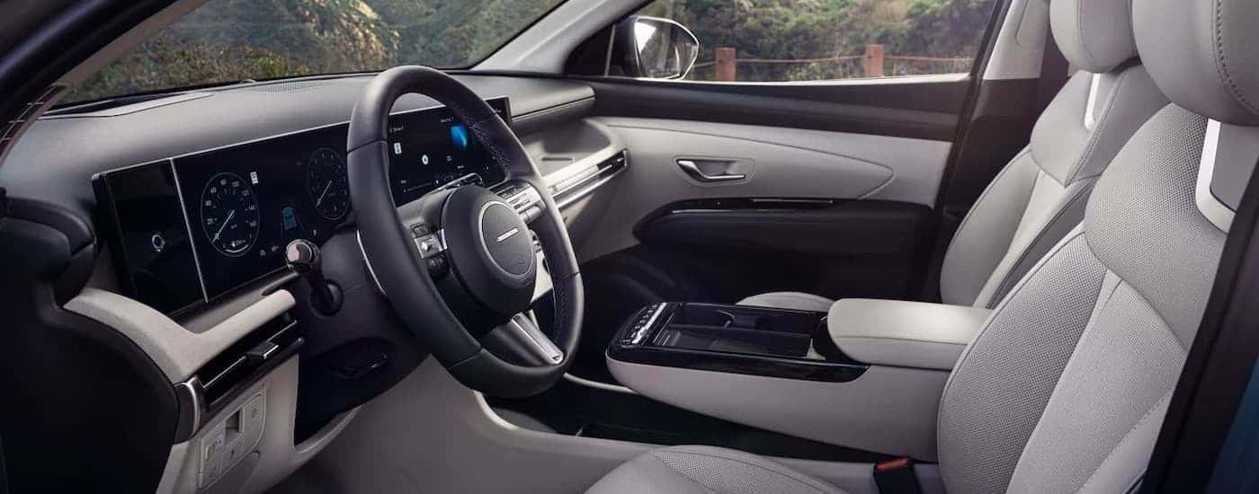 Black and gray interior and dash in a 2025 Hyundai Tucson.