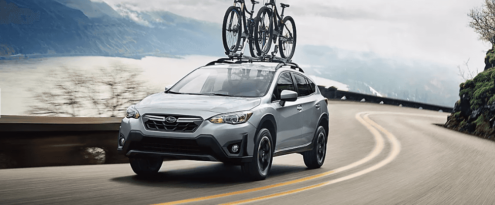 side-view running 2023 Subaru Crosstrek