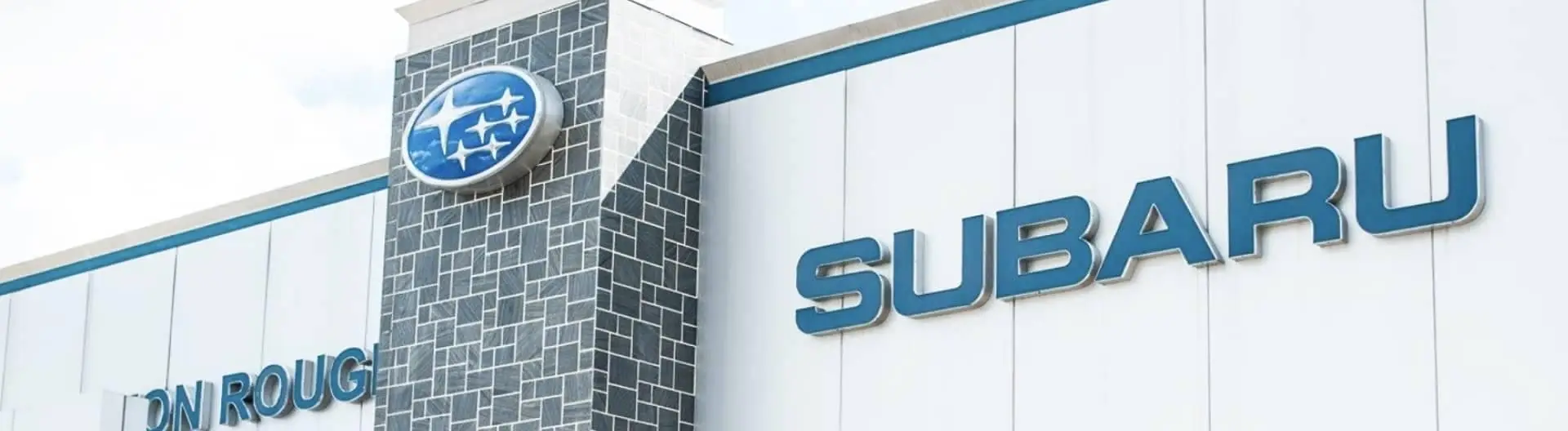 An exterior view of the top of a Subaru Dealership Building