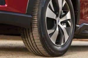 2022 Subaru Ascent- closeup view-front tire-parked-red_mobile