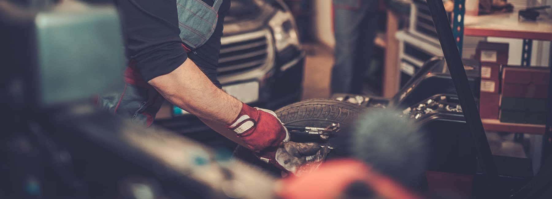Mechanic working on vehicle