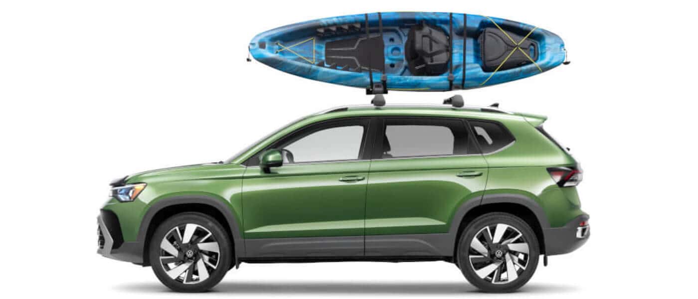 2026 VW Taos Exterior Side View With Kayak On Top