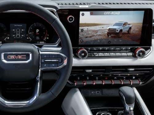 2024 GMC Canyon AT4 view of touchscreen display showing off-road camera view