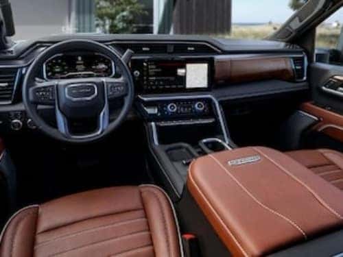 2025 GMC Sierra HD interior view of front seating area and dash