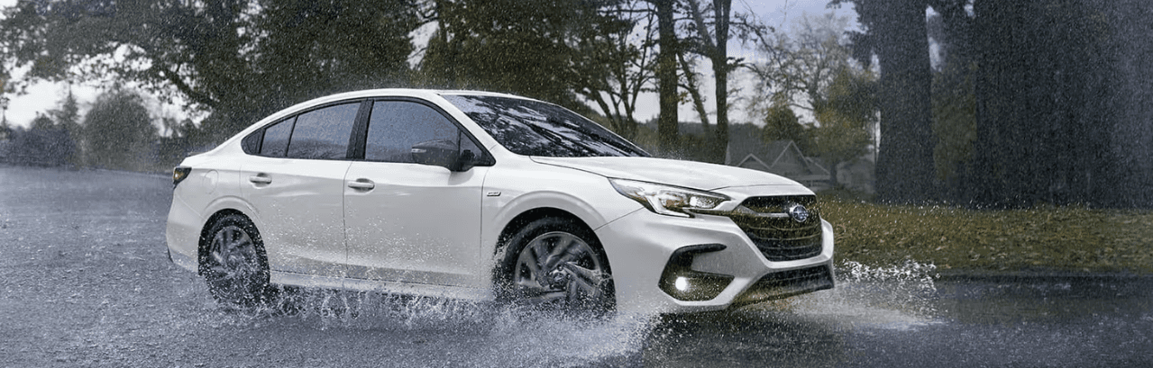 Subaru in the rain